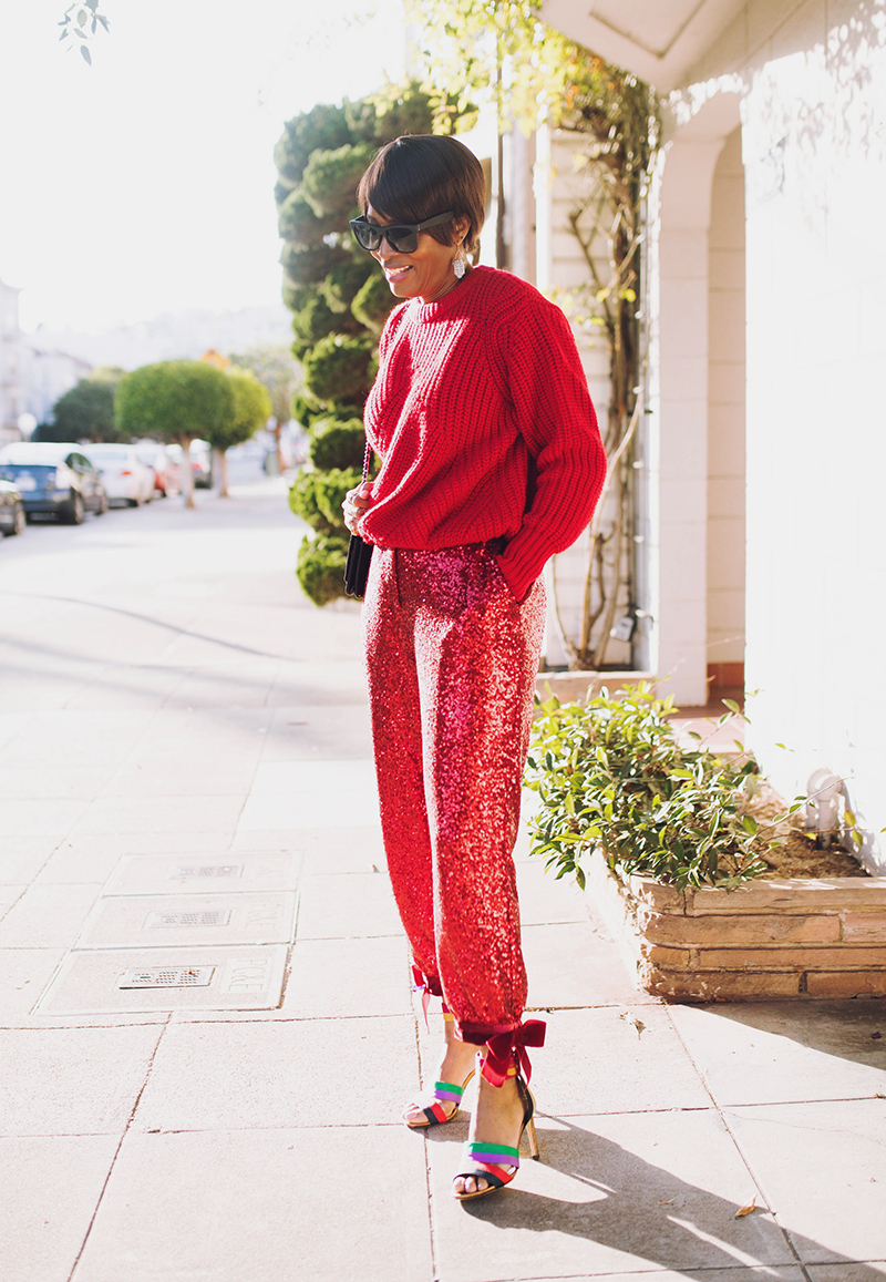 red chunky sweater red sequin pants rainbow sandal